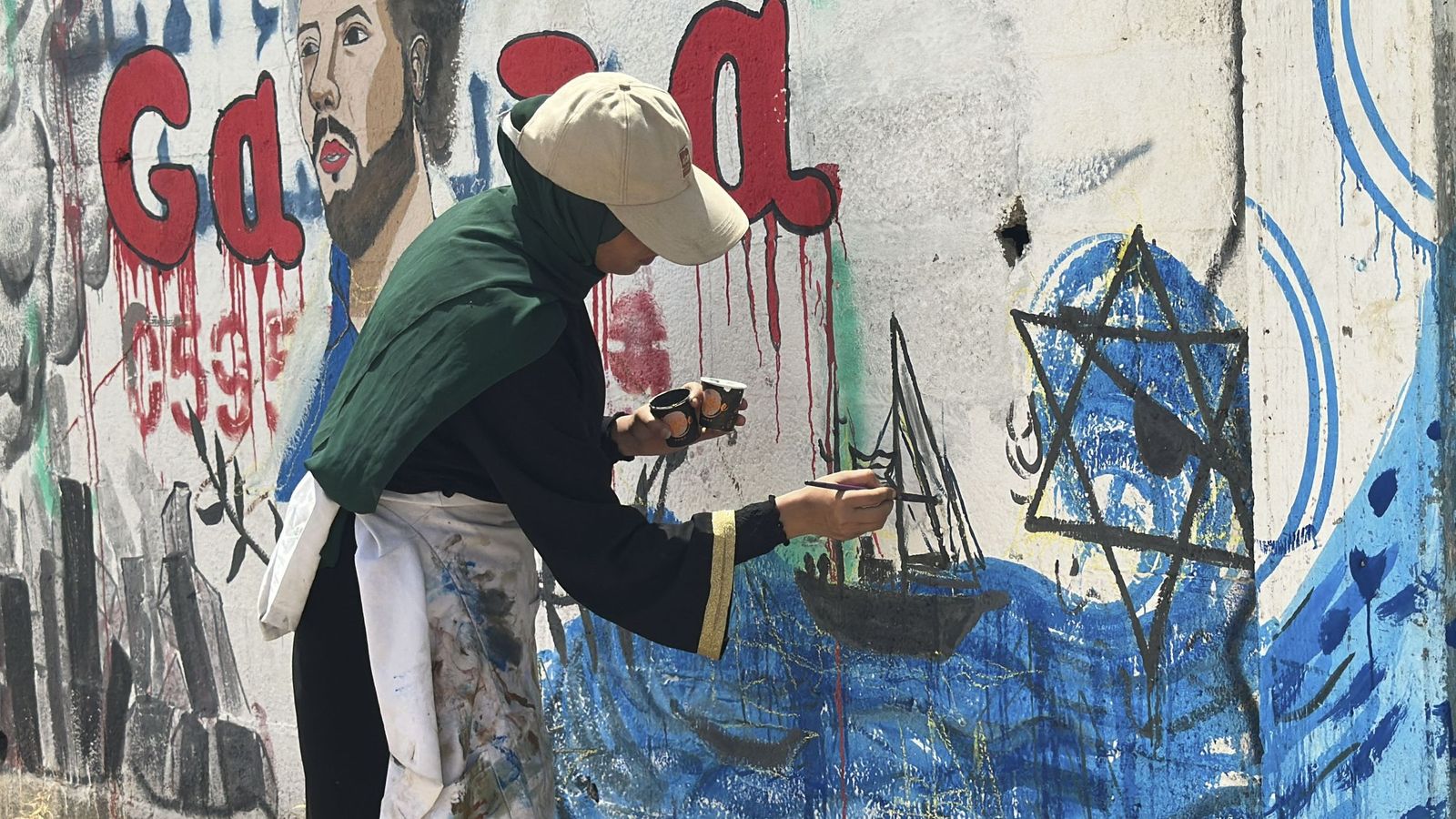 Artistas gazatíes dedican un mural a los activistas de la Flotilla detenidos por Israel